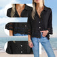 Bluse mit einfarbigem Revers, ausgestellten Ärmeln und Cut-out am Saum