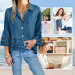 Bluse mit einfarbigem Revers, ausgestellten Ärmeln und Cut-out am Saum