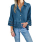 Bluse mit einfarbigem Revers, ausgestellten Ärmeln und Cut-out am Saum